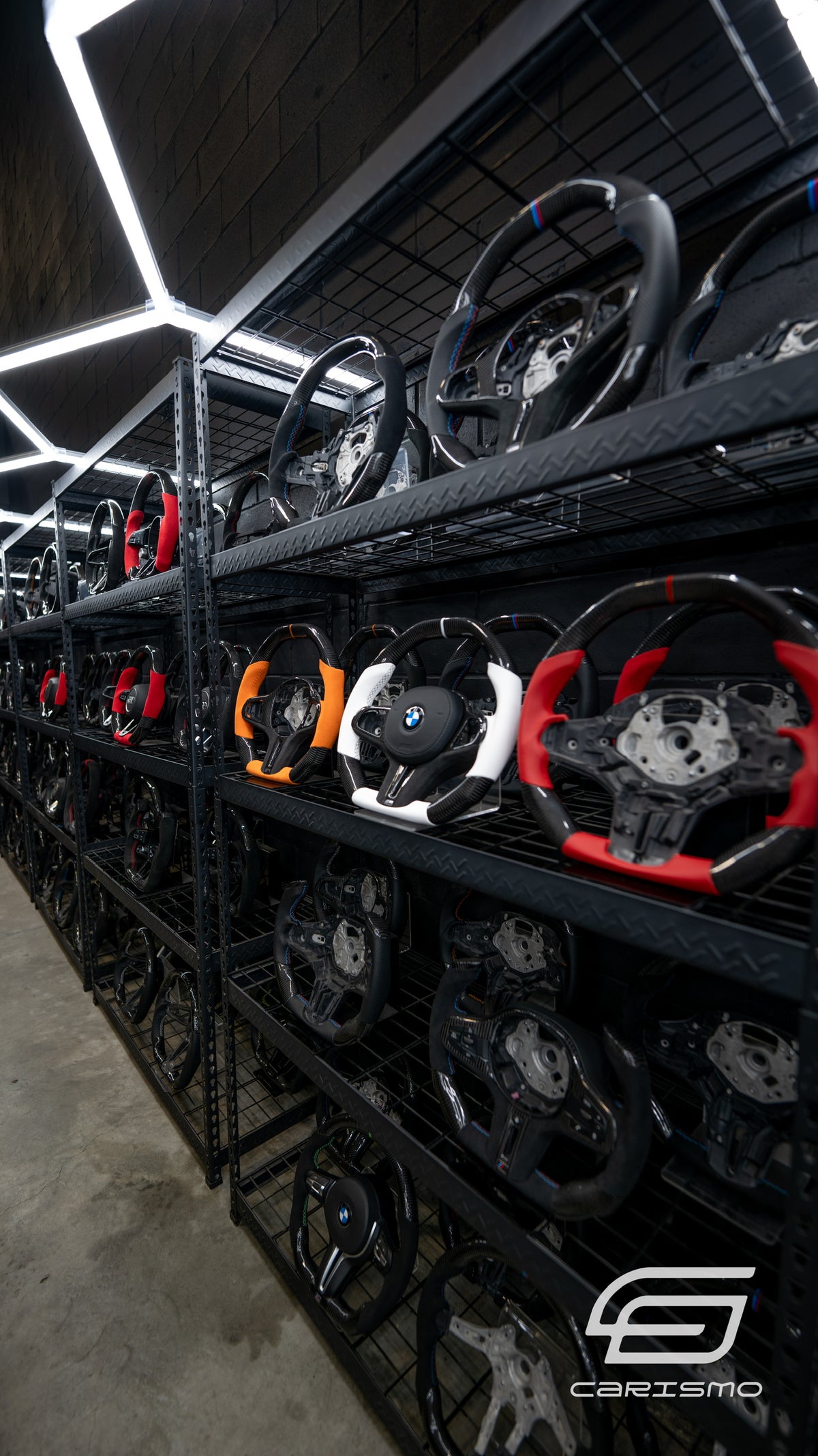 Shelves of finished Carismo steering wheels at HQ