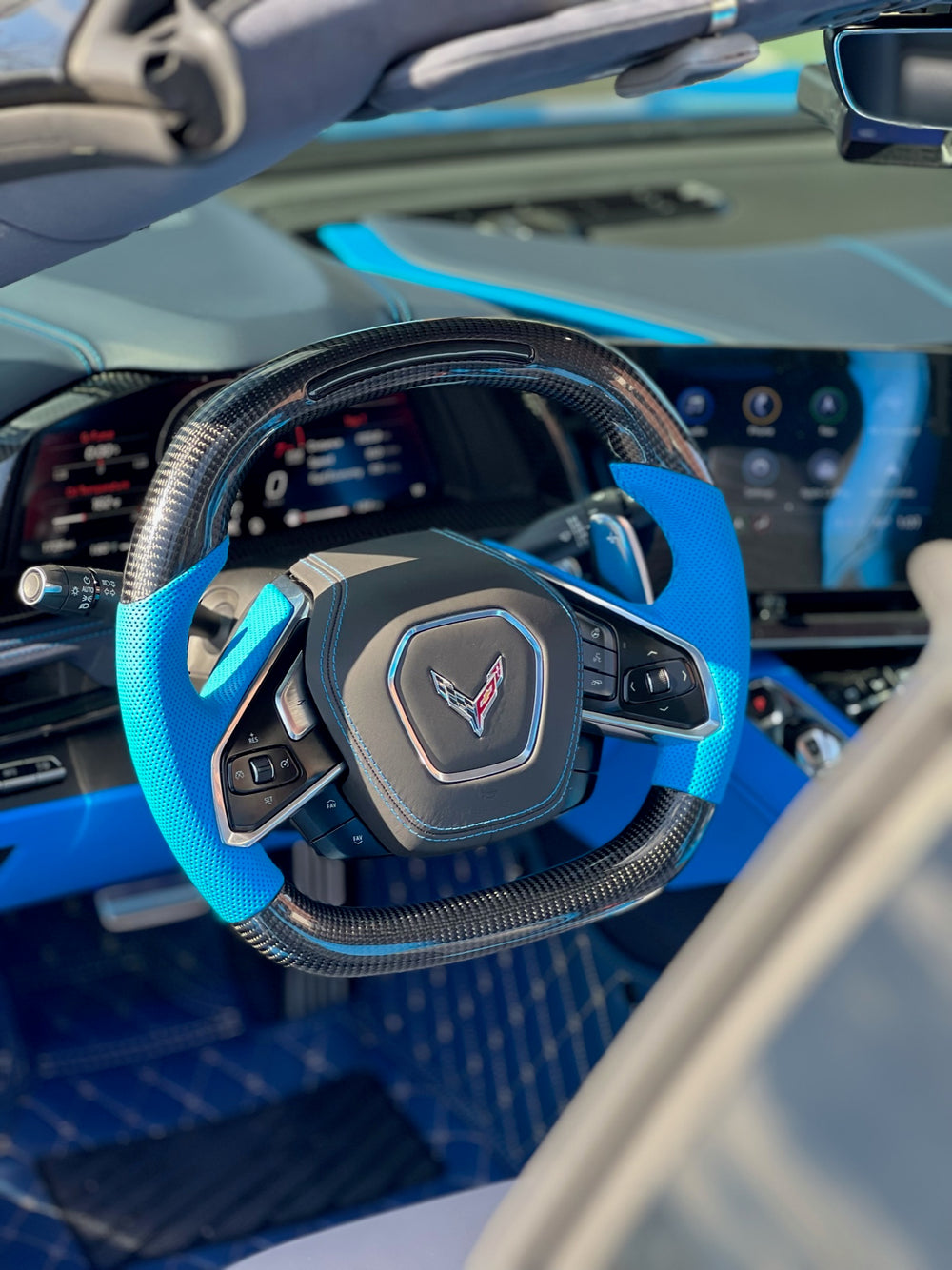 [Made to Order] Chevrolet Corvette (C8) - Sequential RPM LED - Gloss Carbon - Light Blue Perforated Leather - Light Blue Stitching - No Stripe