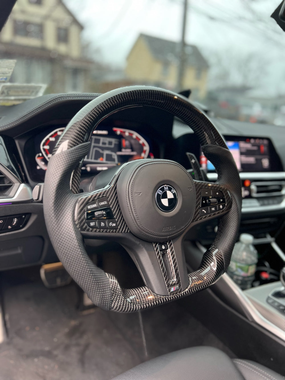 [Made to Order] BMW G-Series (M Performance Wheel) - Sport - Gloss Carbon - Perforated Leather - Black Stitching - No Stripe