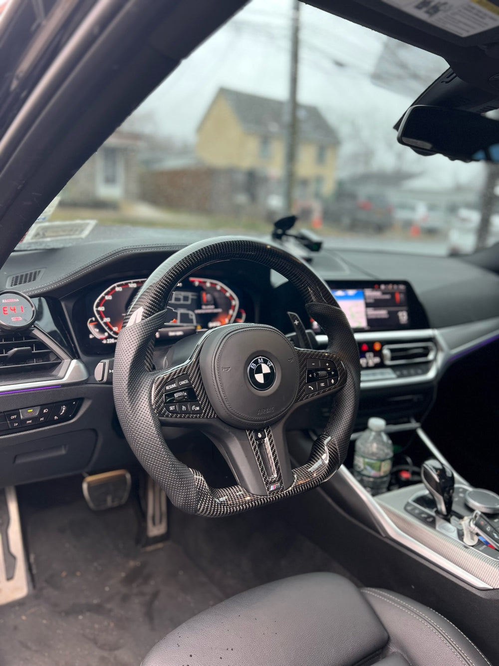 [Made to Order] BMW G-Series (M Performance Wheel) - Sport - Gloss Carbon - Perforated Leather - Black Stitching - No Stripe