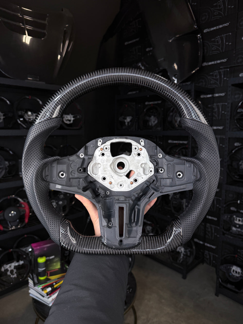 [Made to Order] BMW G-Series (M Performance Wheel) - Sport - Gloss Carbon - Perforated Leather - Black Stitching - No Stripe