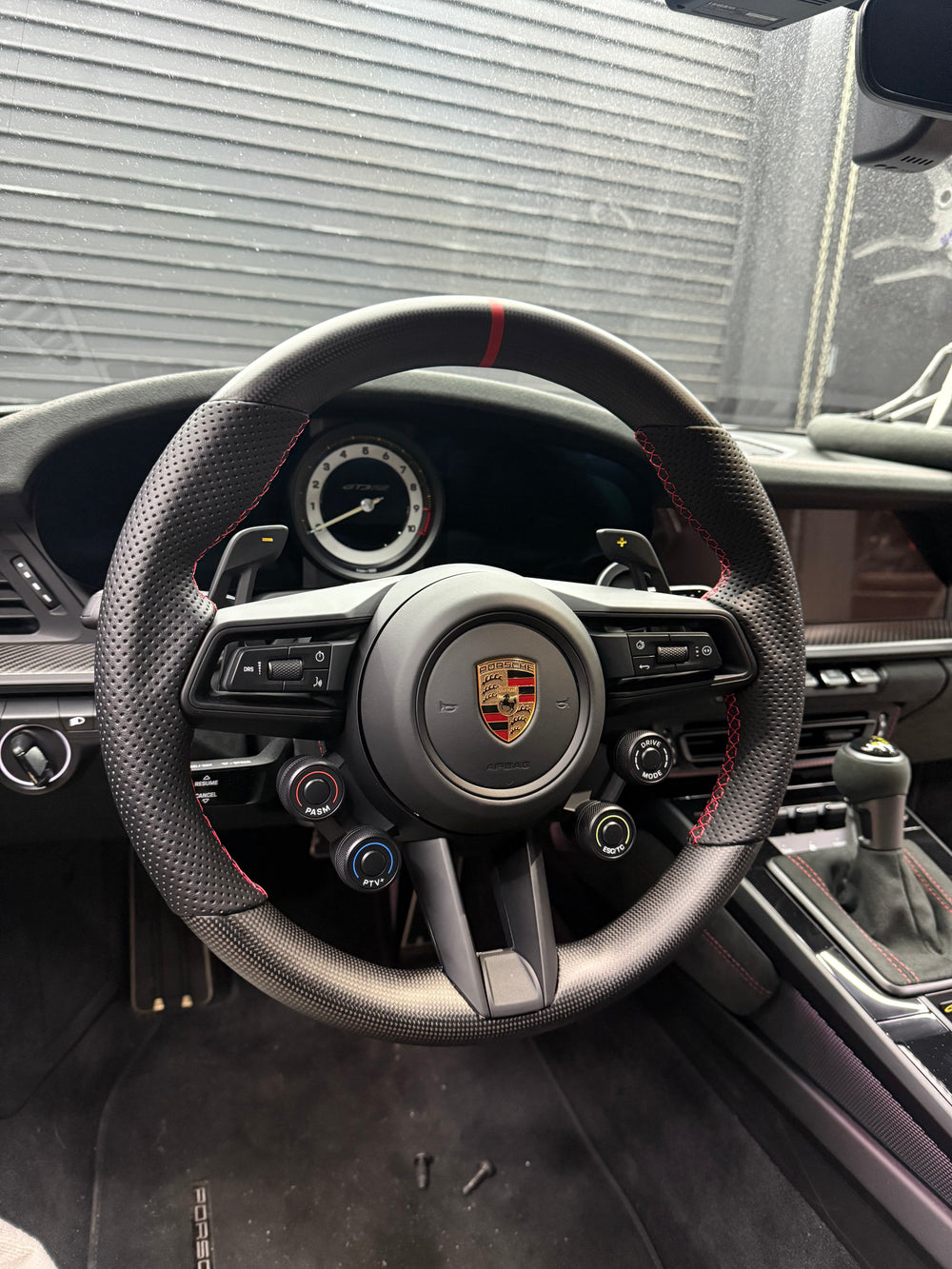 [Made to Order] Porsche (992.1 Wheel) - OEM Shape - Matte Plain Carbon - Perforated Leather - Red Stitching - Red Stripe