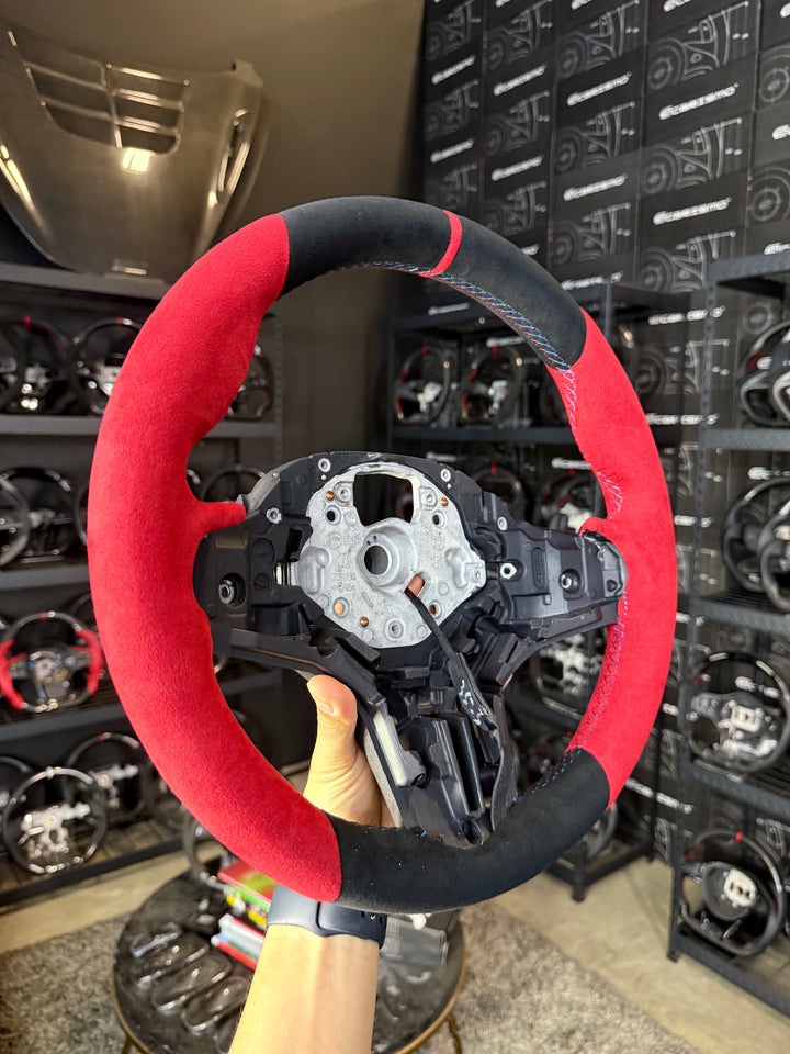 [Media/Test] BMW G-Series (M Performance Wheel) - OEM Shape - Full Alcantara - Red Alcantara Sides - BMW M Colors Stitching - Red Stripe (Heated)