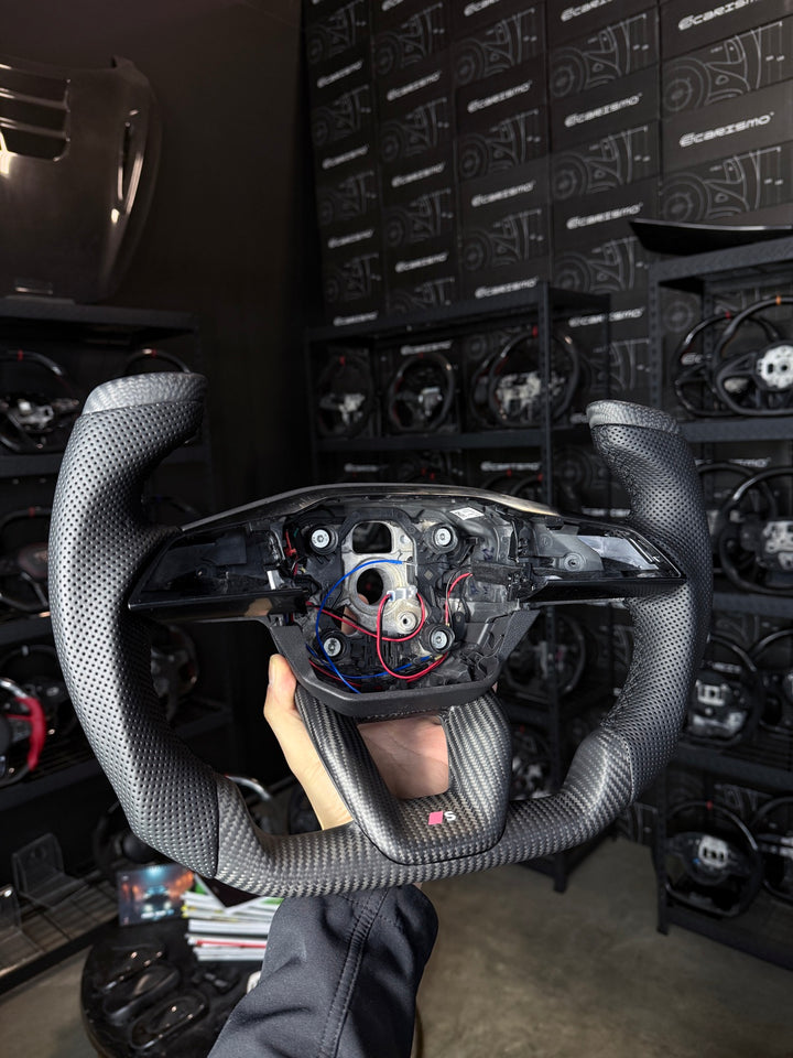 [Made to Order] Audi (B10 Wheel) - F1 Competition - Matte Carbon - Perforated Leather - Black Stitching - No Stripe