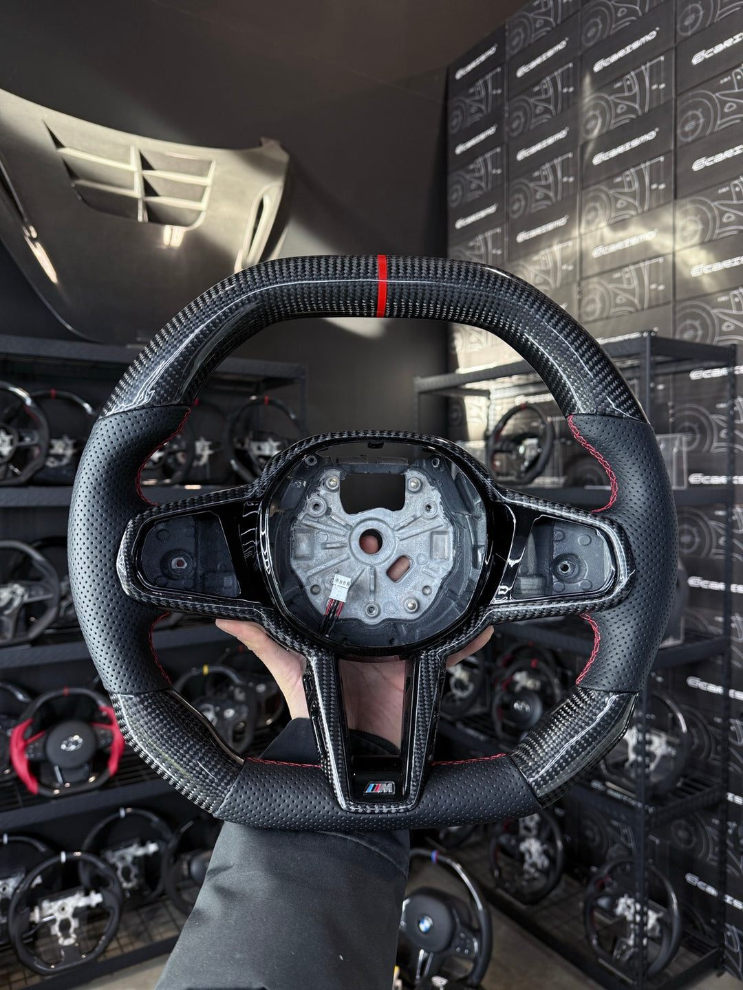[Made to Order] BMW G-Series LCI (M Performance Wheel) - Signature - Gloss Carbon - Perforated Leather - Red Stitching - Red Stripe