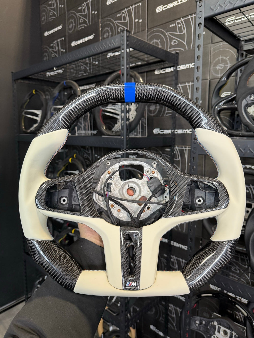 [Made to Order] BMW G-Series (M Performance Wheel) - Signature - Gloss Carbon - Cream Smooth Leather - BMW M Colors Stitching - Blue Stripe