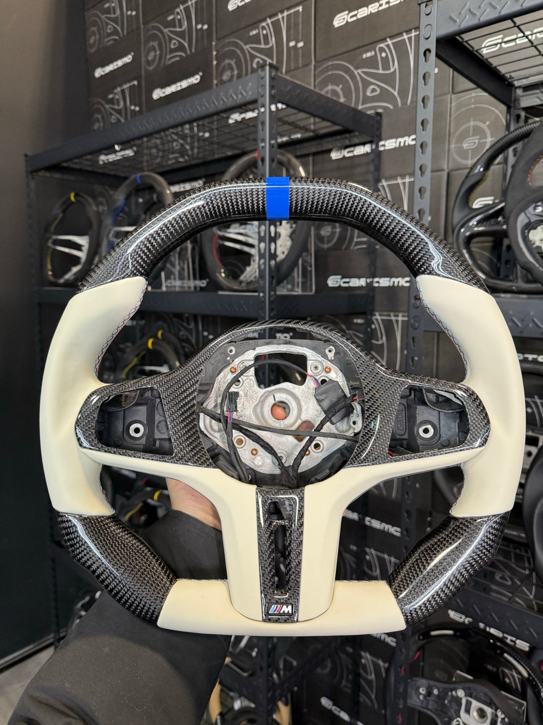 [Made to Order] BMW G-Series (M Performance Wheel) - Signature - Gloss Carbon - Cream Smooth Leather - BMW M Colors Stitching - Blue Stripe
