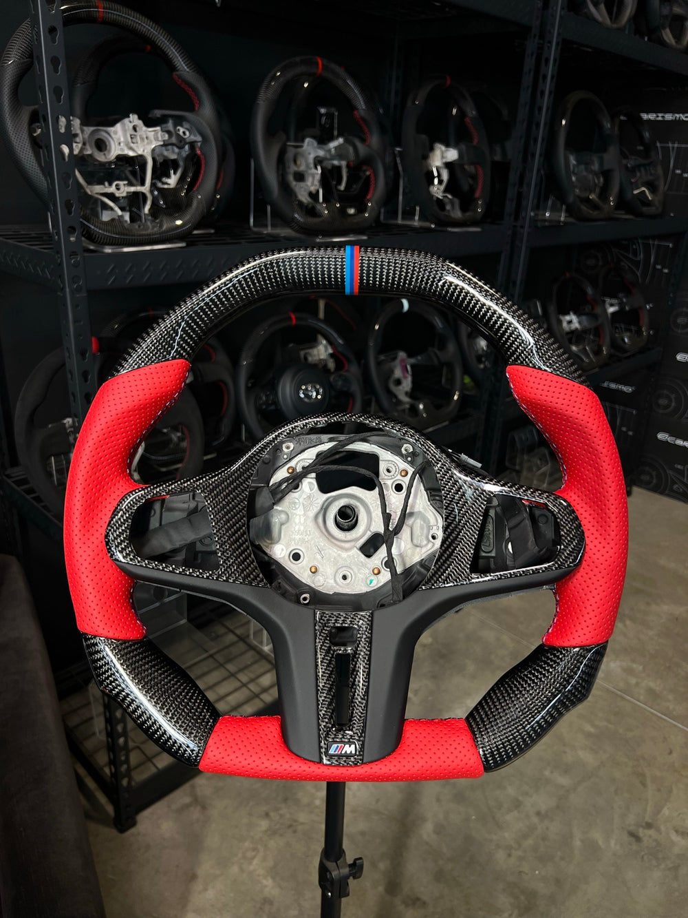 [Made to Order] BMW G-Series (M Performance Wheel) - Signature - Gloss Carbon - Red Perforated Leather - BMW M Colors Stitching - BMW M Colors Stripe
