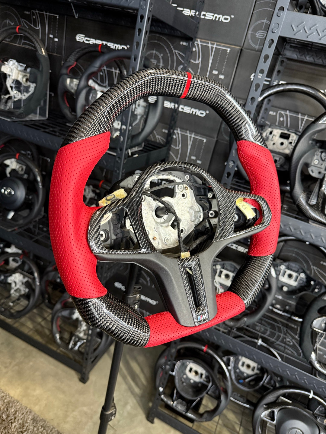 [Made to Order] BMW G-Series (M Performance Wheel) - Signature - Gloss Carbon - Red Perforated Leather - Red Stitching - Red Stripe
