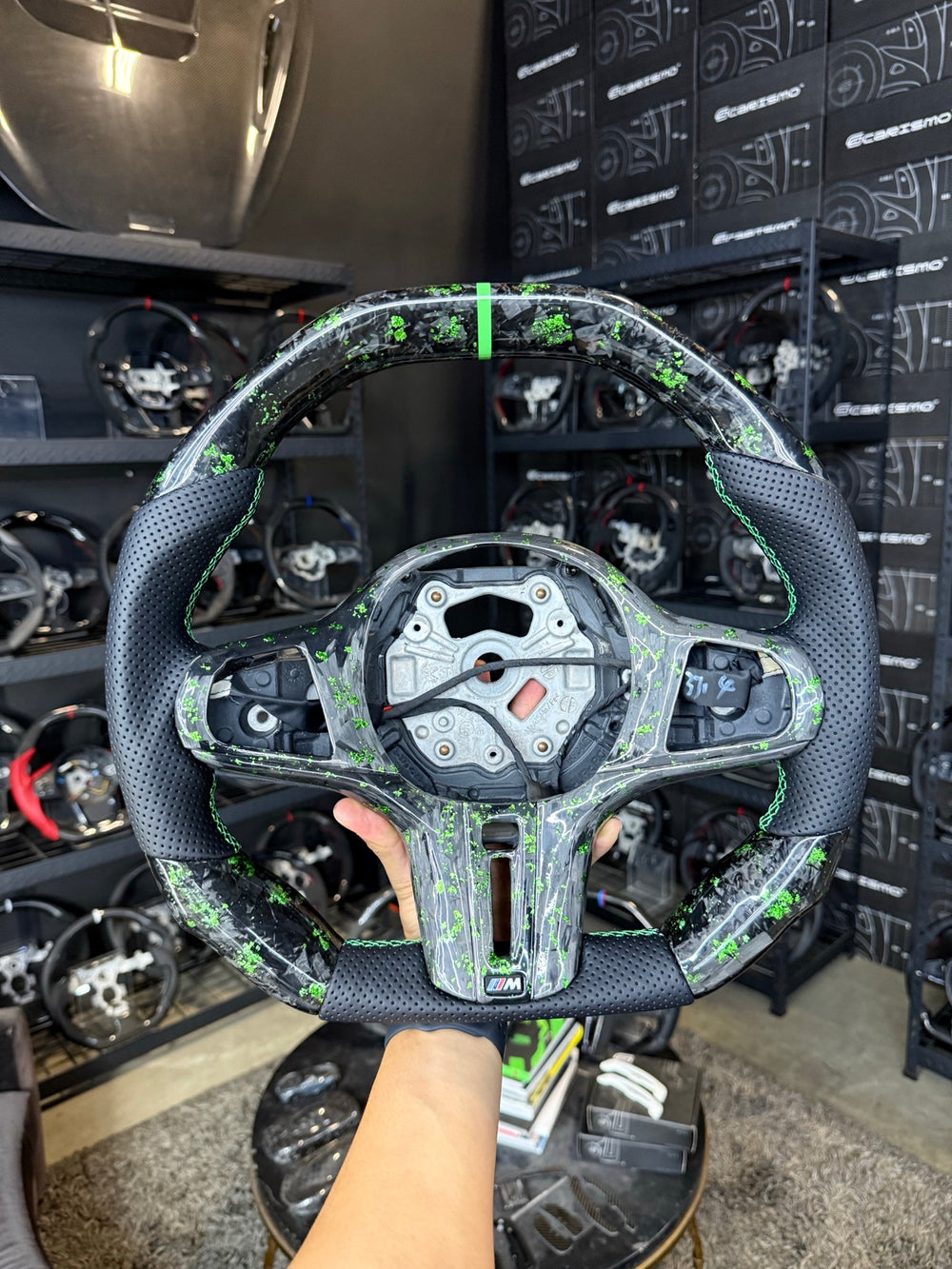 [Made to Order] BMW G-Series (M Performance Wheel) - Signature - Gloss Forged Carbon with Green Flakes - Perforated Leather - Green Stitching - Green Stripe