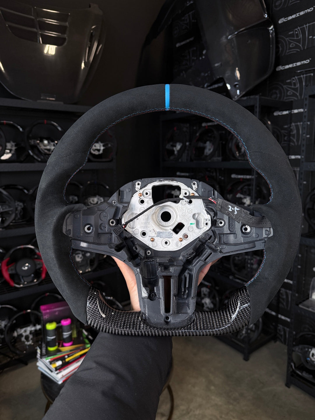 [Made to Order] BMW G-Series (M Performance Wheel) - Sport - Gloss Carbon (Bottom Section) - Alcantara - BMW M Colors Stitching - Light Blue Smooth Leather Stripe