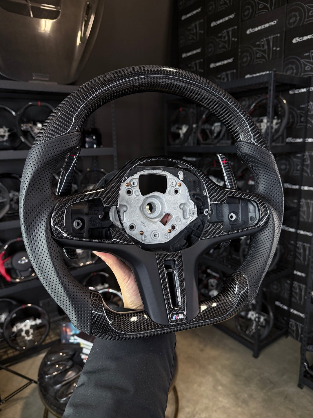 [Made to Order] BMW G-Series (M Performance Wheel) - Sport - Gloss Carbon - Perforated Leather - Black Stitching - No Stripe