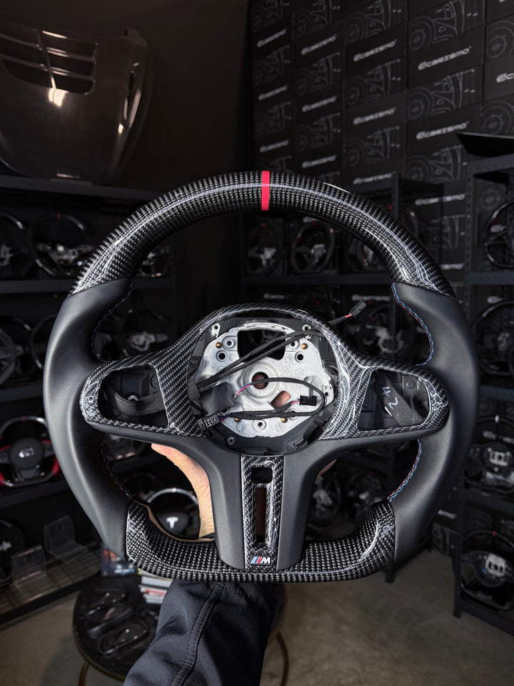 [Made to Order] BMW G-Series (M Performance Wheel) - Sport - Gloss Carbon - Smooth Leather - BMW M Colors Stitching - Red Stripe
