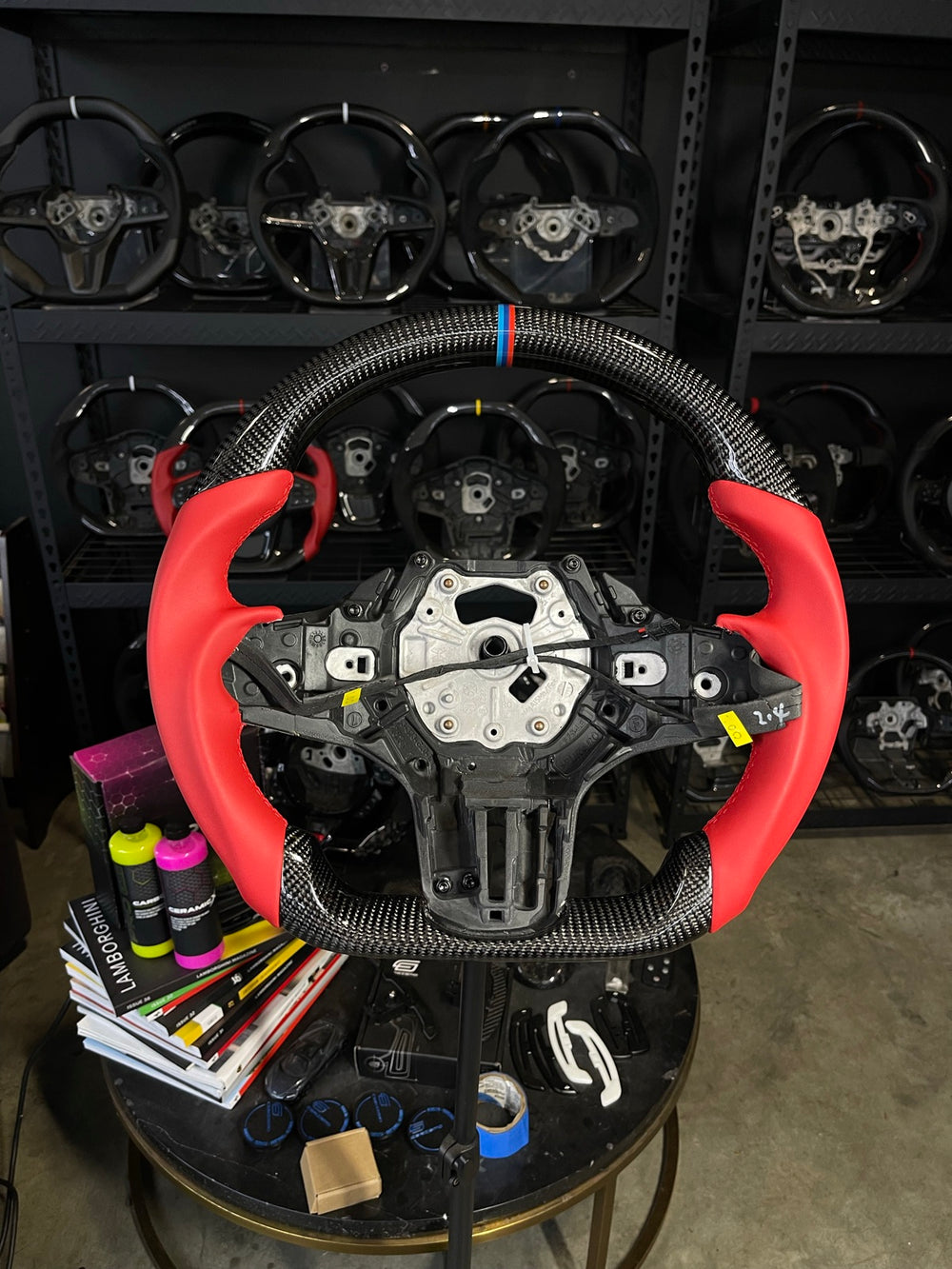[Made to Order] BMW G-Series (M Performance Wheels) - Sport - Gloss Carbon - Red Smooth Leather - Red Stitching - BMW M Colors Stripe