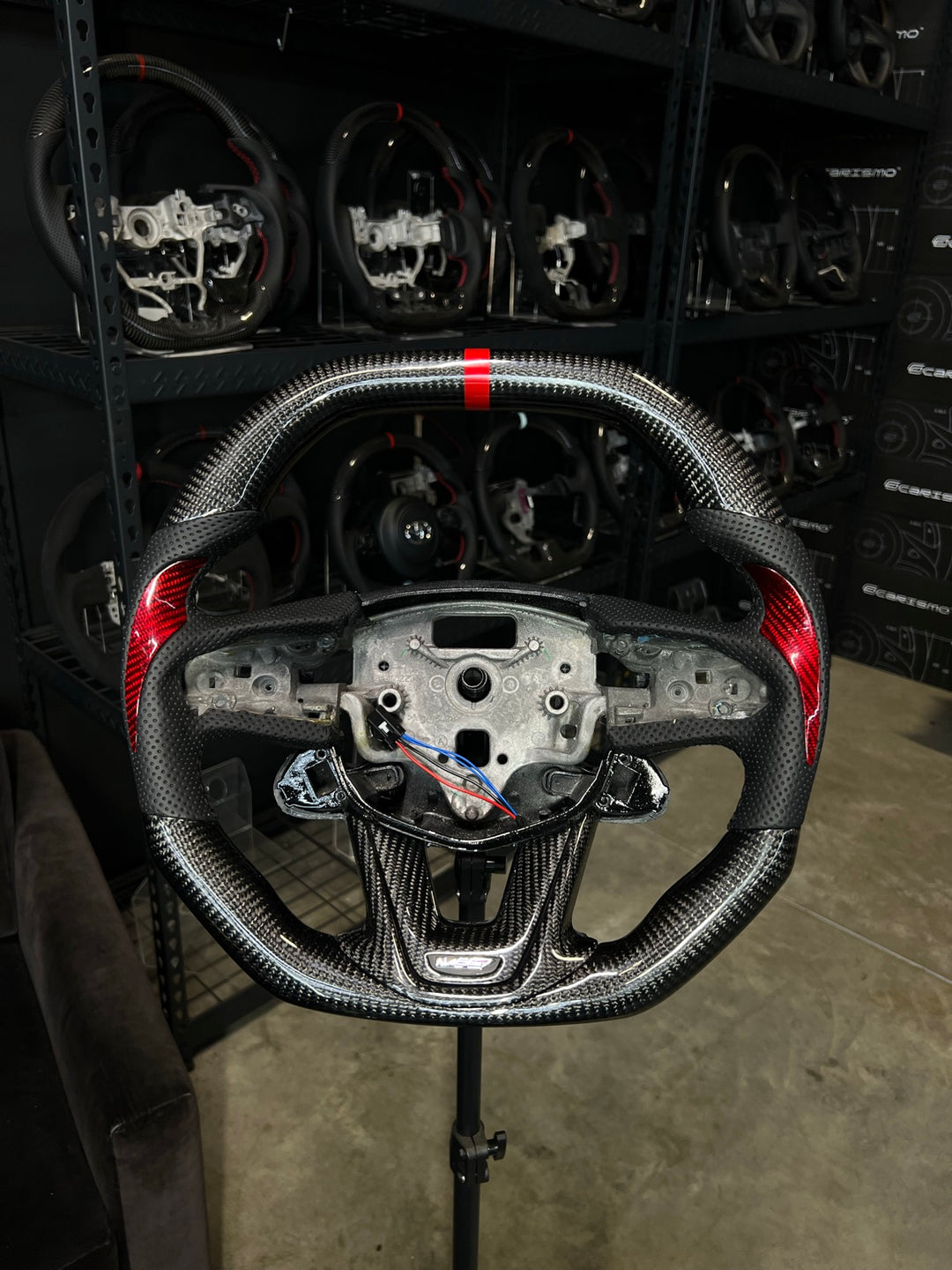 [Made to Order] Cadillac CT5 - Signature - Gloss Carbon - Perforated Leather with Carbon Thumb Grip - Black Stitching - Red Stripe