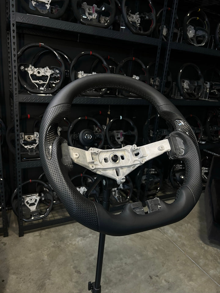 [Made to Order] Jeep Wrangler (JK) - Sport - Full Leather - Perforated Leather with Carbon Thumb Grip - Black Stitching - No Stripe