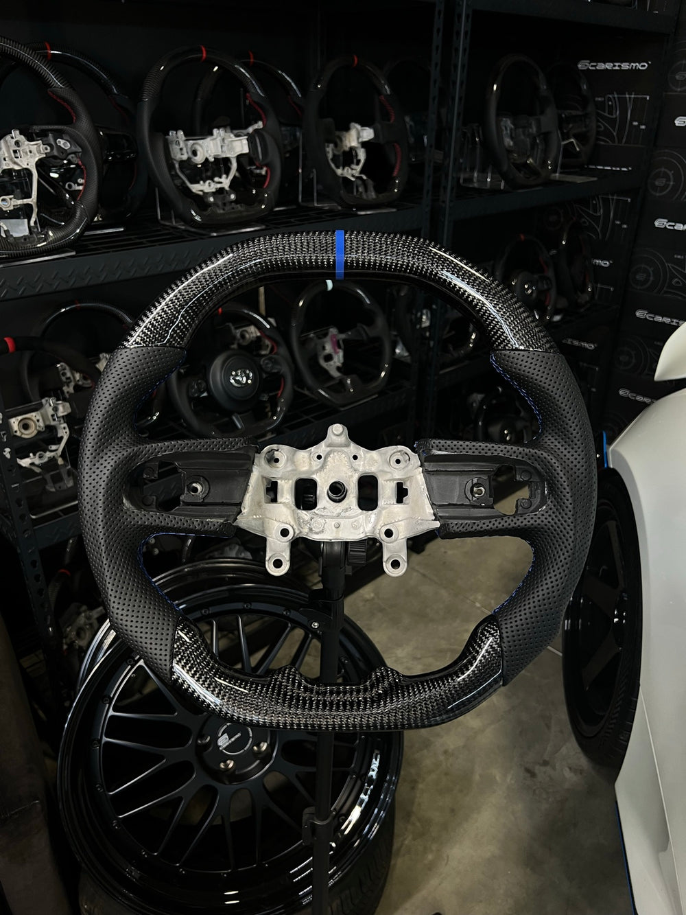 [Made to Order] Jeep Wrangler (JL) - Signature - Gloss Carbon - Perforated Leather - Blue Stitching - Blue Stripe