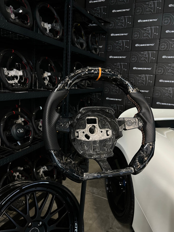 [Made to Order] Lamborghini Huracan - Signature - Gloss Forged Carbon - Perforated Leather - Orange Stitching - Orange Stripe