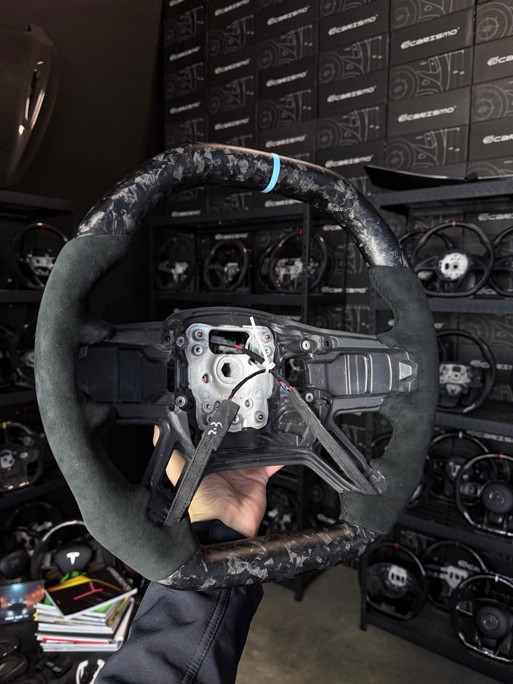 [Made to Order] Land Rover Defender (L663) - Signature - Matte Forged Carbon - Alcantara - Black Stitching - Light Blue Stripe