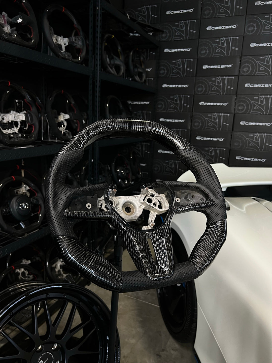 [Made to Order] Nissan GT-R (R35 EBA) - Signature - Gloss Carbon - Perforated Leather - Black Stitching - Black Stripe