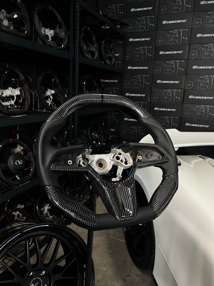 [Made to Order] Nissan GT-R (R35 EBA) - Signature - Gloss Carbon - Perforated Leather - Black Stitching - Black Stripe
