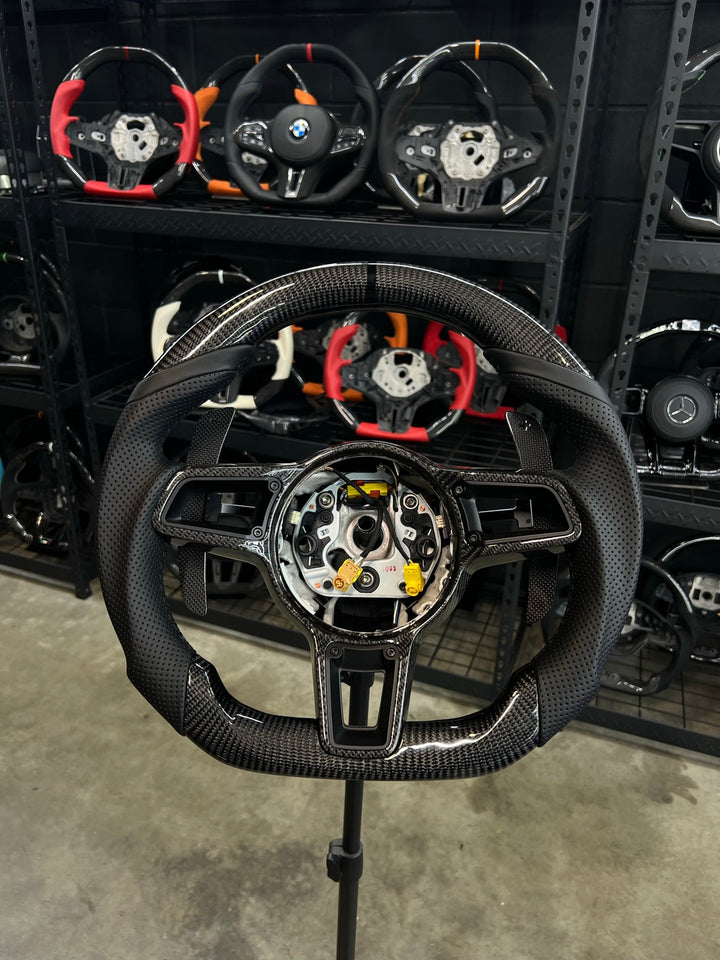 [Made to Order] Porsche (991.2 Wheel) - Sport - Gloss Carbon - Perforated Leather - Black Stitching - Black Stripe