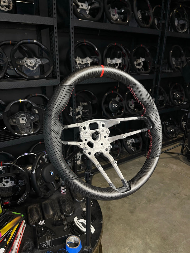 [Made to Order] Porsche (992.1 Wheel) - OEM Shape - Matte Plain Carbon - Perforated Leather - Red Stitching - Red Stripe