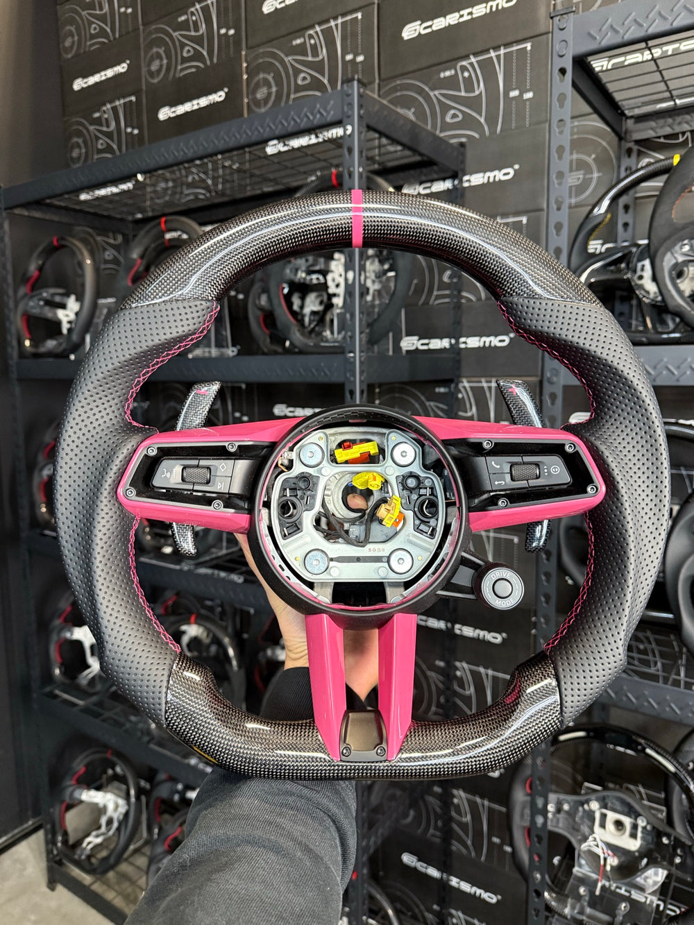 [Made to Order] Porsche (992.1 Wheel) - Sport - Gloss Plain Carbon - Perforated Leather - Pink Stitching - Pink Stripe