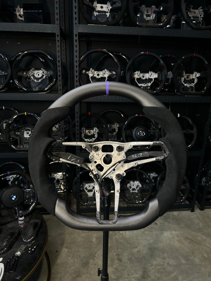 [Made to Order] Porsche (992.1 Wheel) - Sport - Matte Plain Carbon - Alcantara - Black Stitching - Purple Stripe