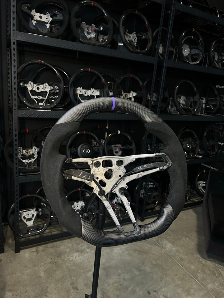 [Made to Order] Porsche (992.1 Wheel) - Sport - Matte Plain Carbon - Alcantara - Black Stitching - Purple Stripe