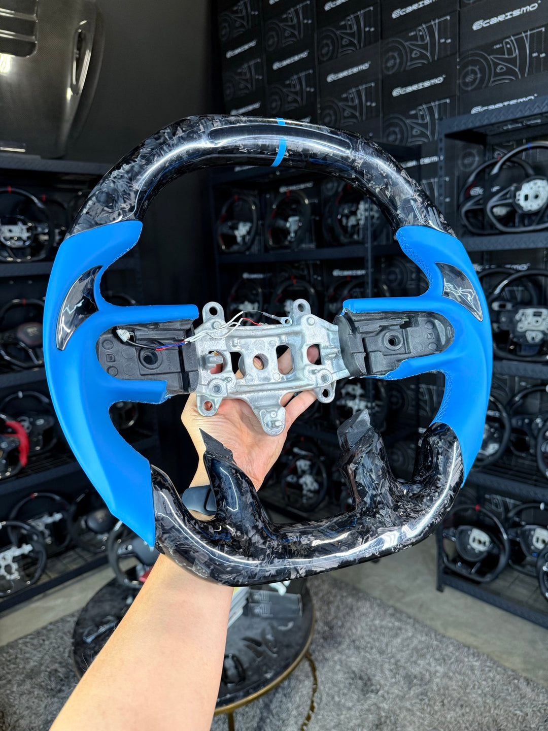 [Made to Order] Ram 1500 TRX (DT) - Sequential RPM LED - Gloss Forged Carbon - Light Blue Smooth Leather with Forged Carbon Thumb Grip - Light Blue Stitching - Light Blue Stripe