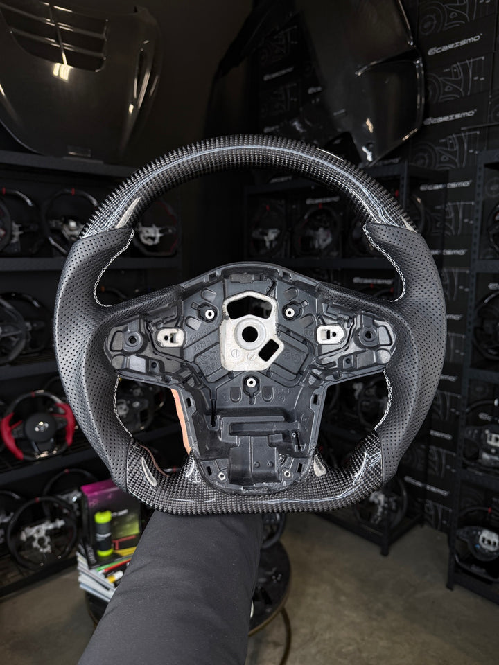 [Made to Order] Toyota Supra (MKV) - Sport - Gloss Carbon - Perforated Leather - White Stitching - No Stripe