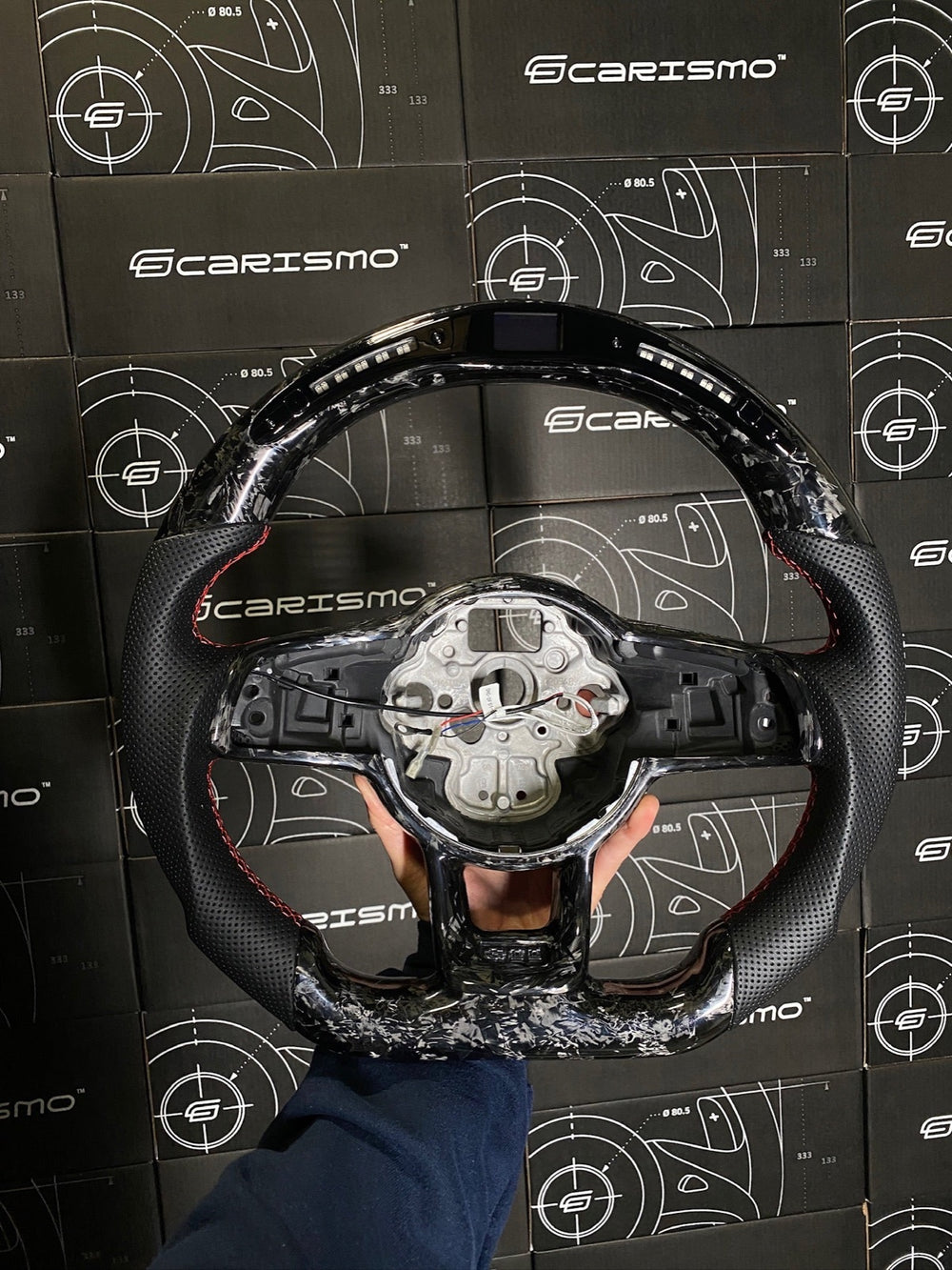 [Made to Order] Volkswagen Golf (MK7) - Classic RPM LED - Gloss Forged Carbon - Perforated Leather - Red Stitching - No Stripe